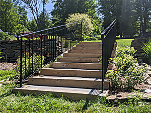 Railing on wood and stone steps