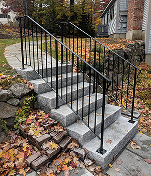 Straight railing on granite steps