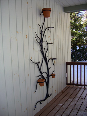 Custom iron tree with flower pot rings